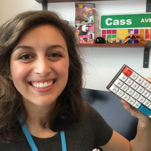 Cassidy Williams holding a mechanical keyboard